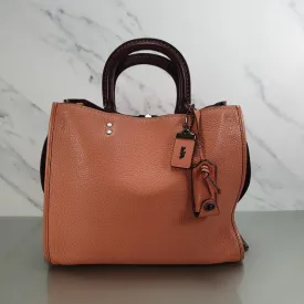 Coach 1941 Rogue 31 in Melon with Burgundy Colorblock Detail and Suede