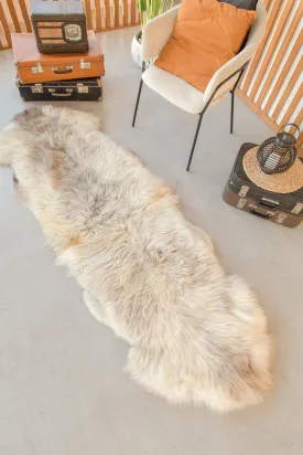 Rug made of two natural sheepskin hides